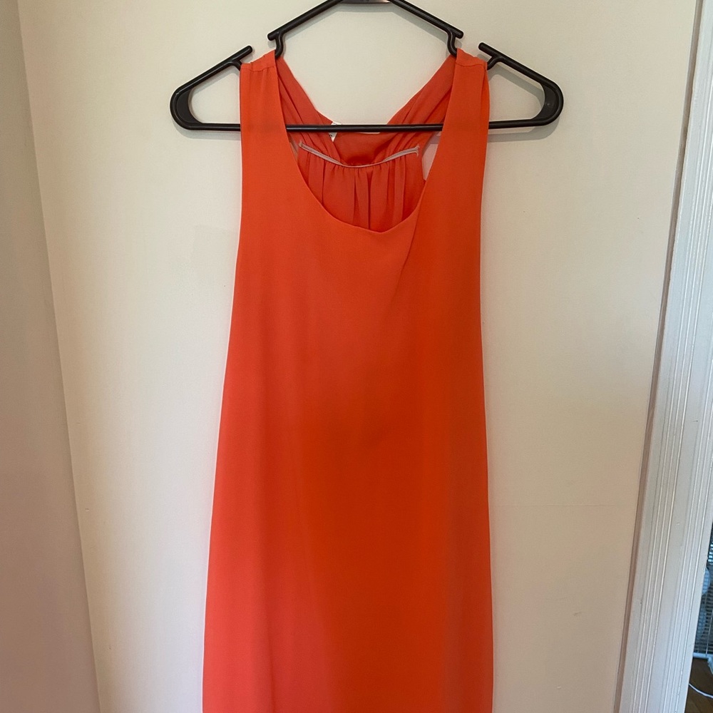 Peach sundress with a cute bow on the back!